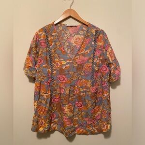 Boutique plus size floral peplum top